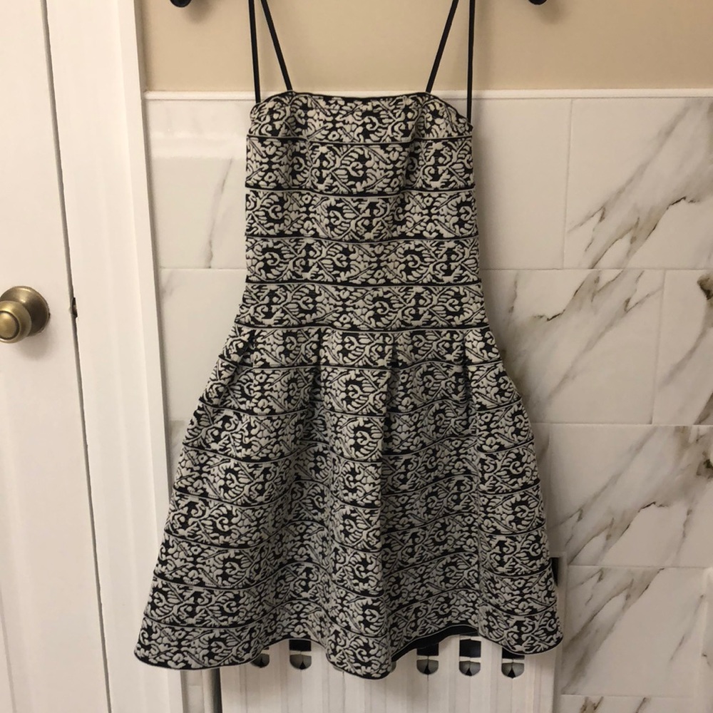 Strapless black and white bandage dress